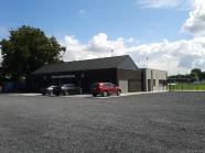 Reconstruction d''une infrastructure sportive existante et aménagement d'un parking